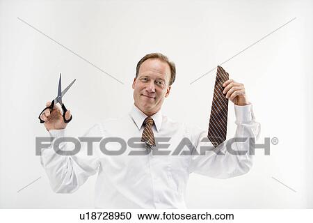Businessman with cut tie View Large Photo Image Stock Image - Businessman with cut tie. Fotosearch