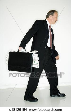 Picture - Businessman with money. Fotosearch
