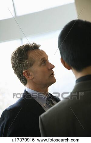 Businessmen Talking View Large Photo Image Stock Photograph - Businessmen Talking. Fotosearch