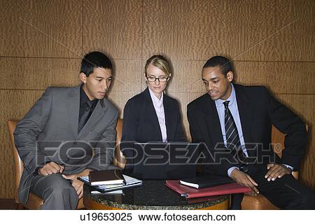 Businesspeople Looking at Laptop View Large Photo Image Stock Photography - Businesspeople Looking at Laptop. Fotosearch