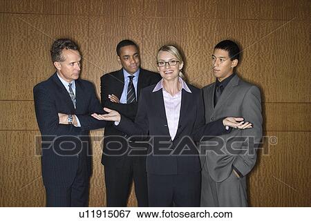 Stock Photo - Businesswoman Amongst Businessmen. Fotosearch