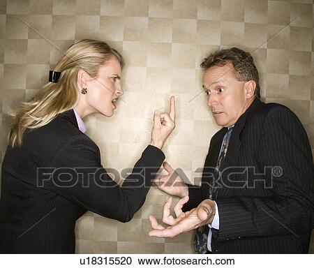 Businesswoman Flipping off Businessman View Large Photo Image Stock Image - Businesswoman Flipping off Businessman. Fotosearch