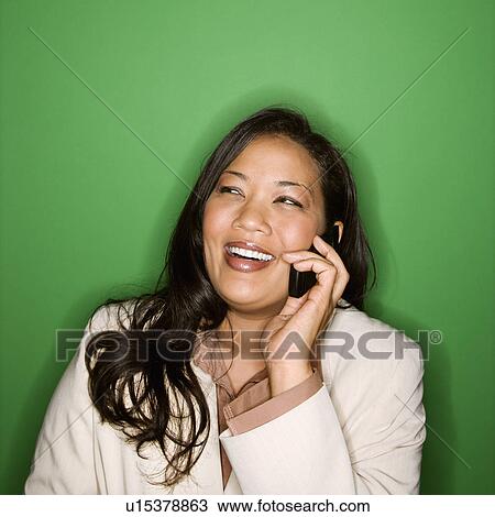 Businesswoman on cellphone View Large Photo Image Stock Image - Businesswoman on cellphone. Fotosearch