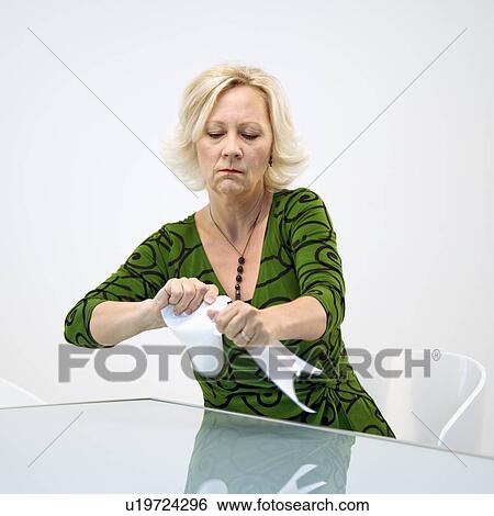 Businesswoman ripping papers View Large Photo Image Stock Photograph - Businesswoman ripping papers. Fotosearch