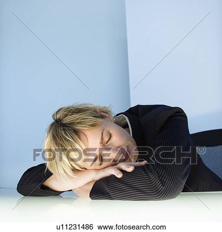 Businesswoman sleeping at desk. View Large Photo Image Stock Photograph - Businesswoman sleeping at desk.. Fotosearch