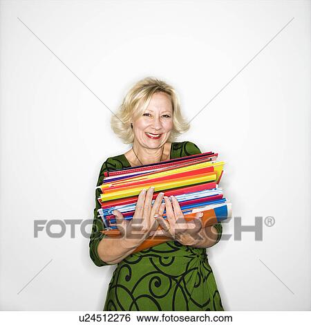 Businesswoman with workload View Large Photo Image Stock Photograph - Businesswoman with workload. Fotosearch