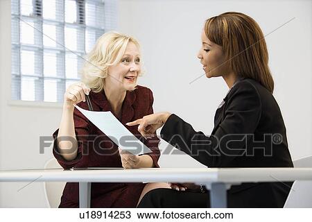 Businesswomen at work View Large Photo Image Stock Image - Businesswomen at work. Fotosearch