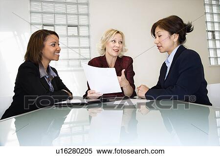 Stock Photography - Businesswomen meeting. Fotosearch