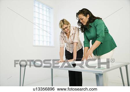 Businesswomen working. View Large Photo Image Stock Photograph - Businesswomen working.. Fotosearch