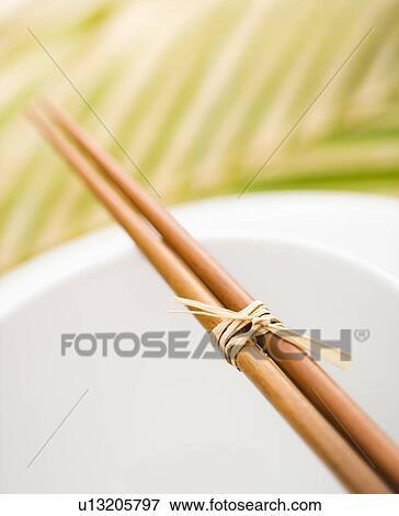 Chopsticks on an Empty Bowl View Large Photo Image Stock Photo - Chopsticks on an Empty Bowl. Fotosearch