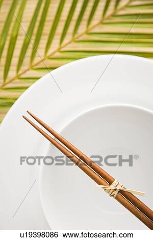 Chopsticks on an Empty Bowl View Large Photo Image Stock Photograph - Chopsticks on an Empty Bowl. Fotosearch