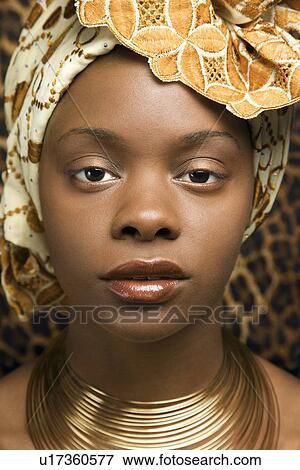 Stock Photo - Close-up of Young Woman in Traditional African Dress. Fotosearch
