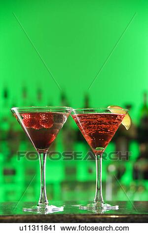Stock Image - Cocktails in Martini Glasses. Fotosearch