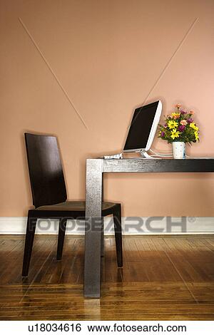 Stock Photograph - Computer on Table with Flowers. Fotosearch