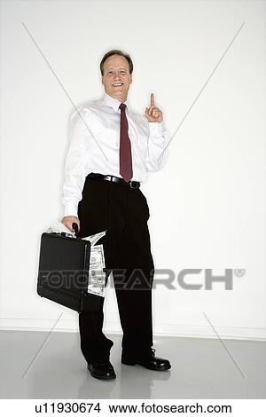 Confident wealthy businessman View Large Photo Image Picture - Confident wealthy businessman. Fotosearch