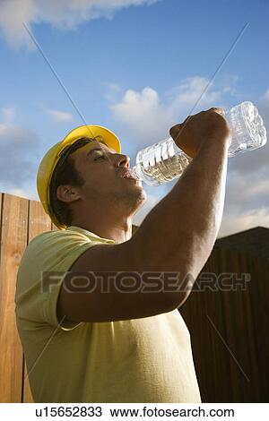 Construction Worker Drinking Water View Large Photo Image Stock Image - Construction Worker Drinking Water. Fotosearch