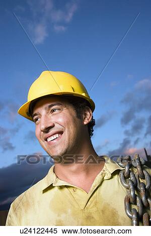 Stock Photography - Construction Worker Smiling. Fotosearch