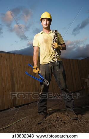 Construction Worker with Bolt Cutters and Chain View Large Photo Image Stock Image - Construction Worker with Bolt Cutters and Chain. Fotosearch