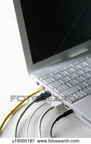 Cords Plugged Into Laptop Computer View Large Photo Image Stock Photo - Cords Plugged Into Laptop Computer. Fotosearch