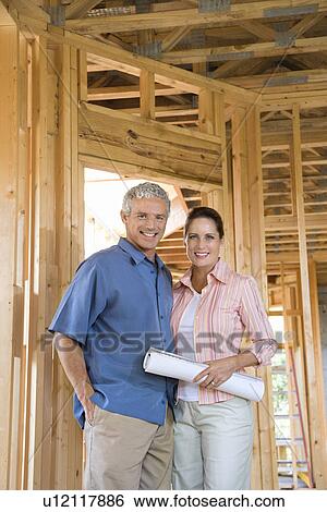 Couple Building Home View Large Photo Image Stock Photograph - Couple Building Home. Fotosearch