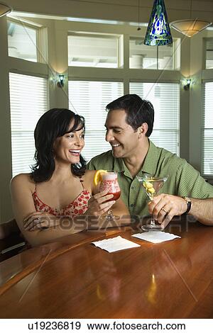 Stock Photo - Couple Having Drinks. Fotosearch