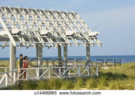 Couple on arbor looking at Sea View Large Photo Image Stock Photography - Couple on arbor looking at Sea. Fotosearch