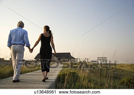 Couple on Boardwalk View Large Photo Image Stock Image - Couple on Boardwalk. Fotosearch