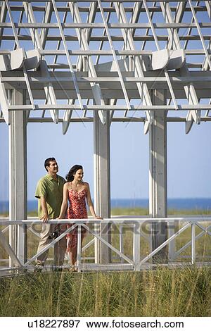 Stock Photo - Couple on Vacation Smiling. Fotosearch