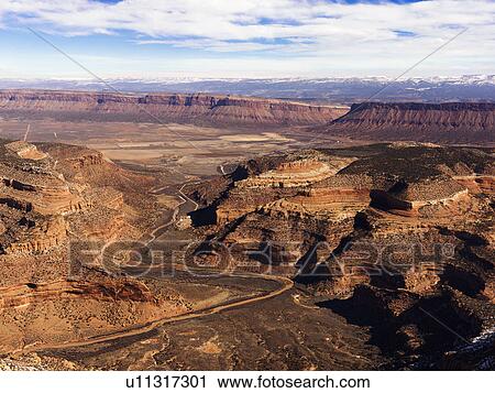 Stock Image - Craggy Landscape With Canyons. Fotosearch