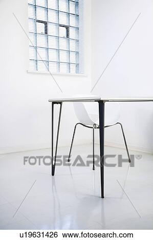 Desk and chair in office View Large Photo Image Stock Photograph - Desk and chair in office. Fotosearch