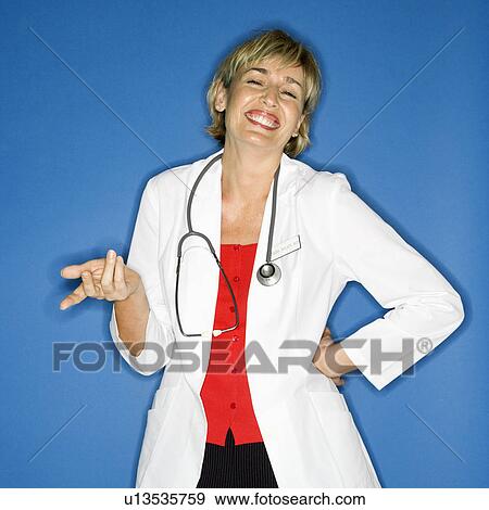Stock Photo - Doctor holding out hand.. Fotosearch