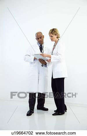Doctors with chart View Large Photo Image Stock Image - Doctors with chart. Fotosearch