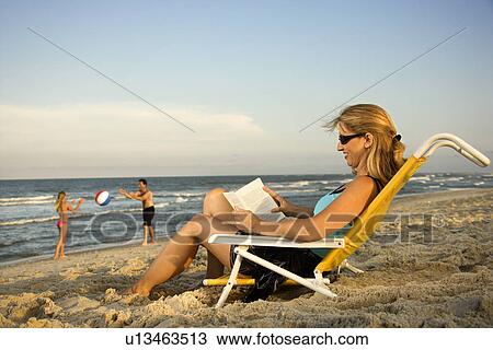 Stock Image - Family at the Beach. Fotosearch