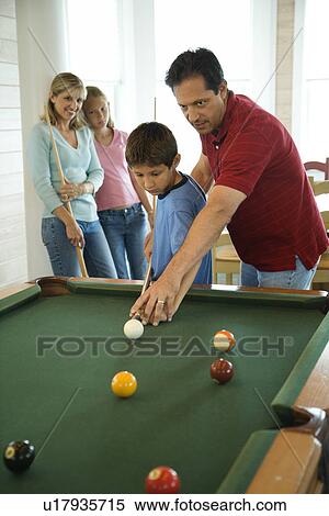 Stock Photography - Family Playing Pool. Fotosearch