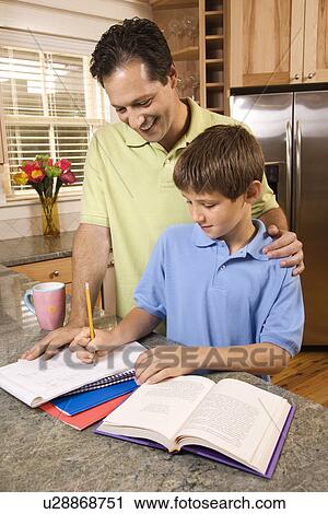 Father Helping Son with Homework View Large Photo Image Stock Image - Father Helping Son with Homework. Fotosearch