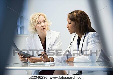 Female doctors View Large Photo Image Stock Photograph - Female doctors. Fotosearch
