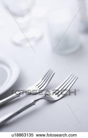 Stock Photography - Forks on Dining Table. Fotosearch