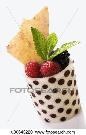 Stock Image - Fruit Cup With Mint Leaves. Fotosearch