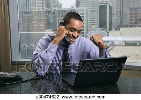 Stock Image - Happy and Excited Businessman. Fotosearch