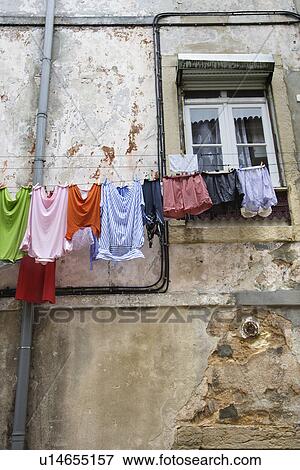 Stock Photo - Laundry Drying on a Clothesline. Fotosearch