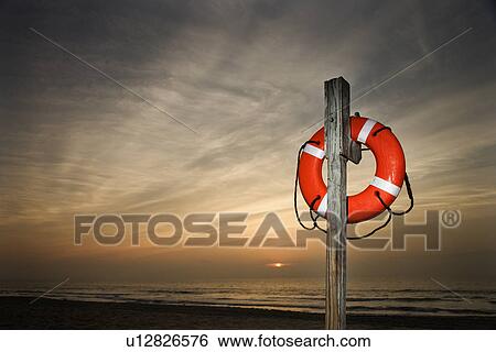 Stock Photograph - Life Saver on Beach. Fotosearch