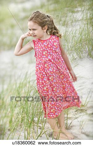 Stock Image - Little Girl at the Beach. Fotosearch