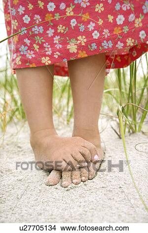 Little Girl S Feet In The Sand Picture U Fotosearch