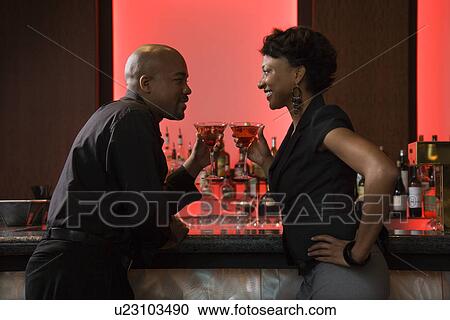 Man and Woman Drinking at Bar View Large Photo Image Stock Image - Man and Woman Drinking at Bar. Fotosearch