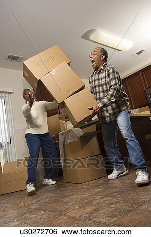 Man Dropping Stack of Boxes View Large Photo Image Stock Photograph - Man Dropping Stack of Boxes . Fotosearch