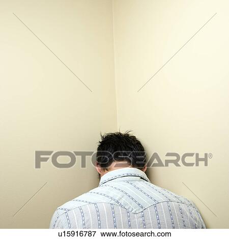 Man in corner View Large Photo Image Stock Photo - Man in corner. Fotosearch