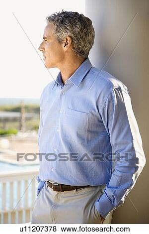 Stock Photo - Man looking pensive. Fotosearch