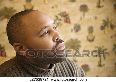Man with Thoughtful Gaze View Large Photo Image Stock Image - Man with Thoughtful Gaze. Fotosearch