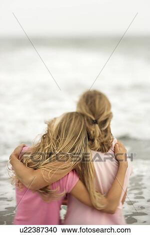 Stock Image - Mother and Daughter at the Beach. Fotosearch