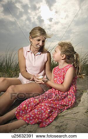 Mother and Daughter at the Beach View Large Photo Image Stock Image - Mother and Daughter at the Beach. Fotosearch
